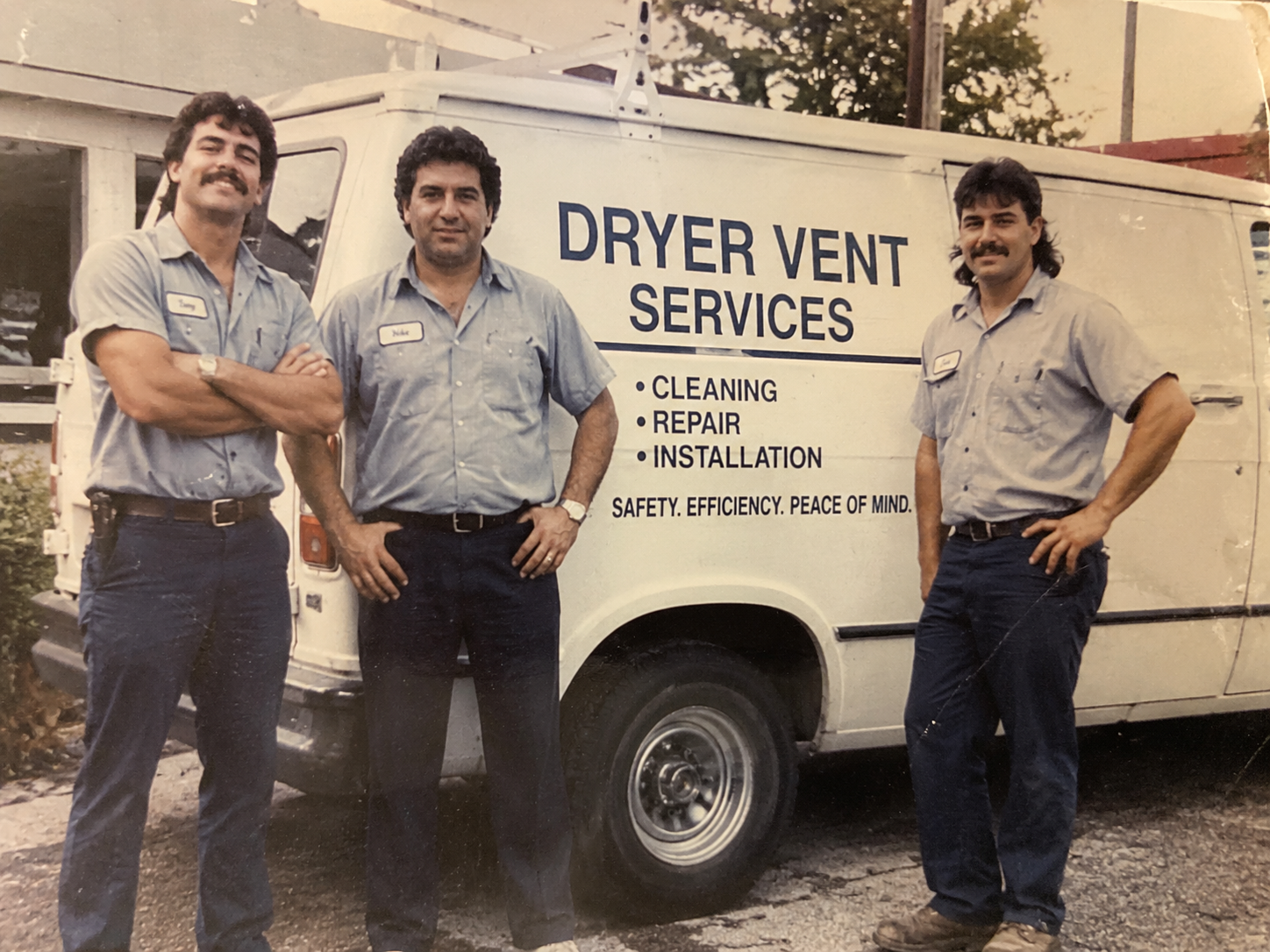 DryerToday team with happy family and branded van